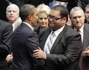 President Obama congratulates gay hero Daniel Hernandez for his role in saving Rep. Gabrielle Giffords' life in 2011 [AP photo].